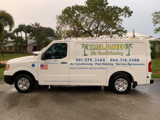 Island Air’s branded service van parked in a residential neighborhood
